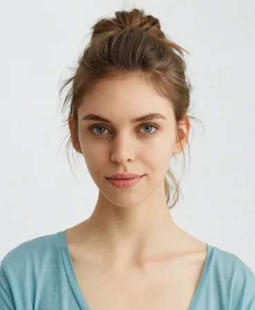 portrait-of-fair-haired-woman-with-warm-blue-eyes-HCAE3TB.png